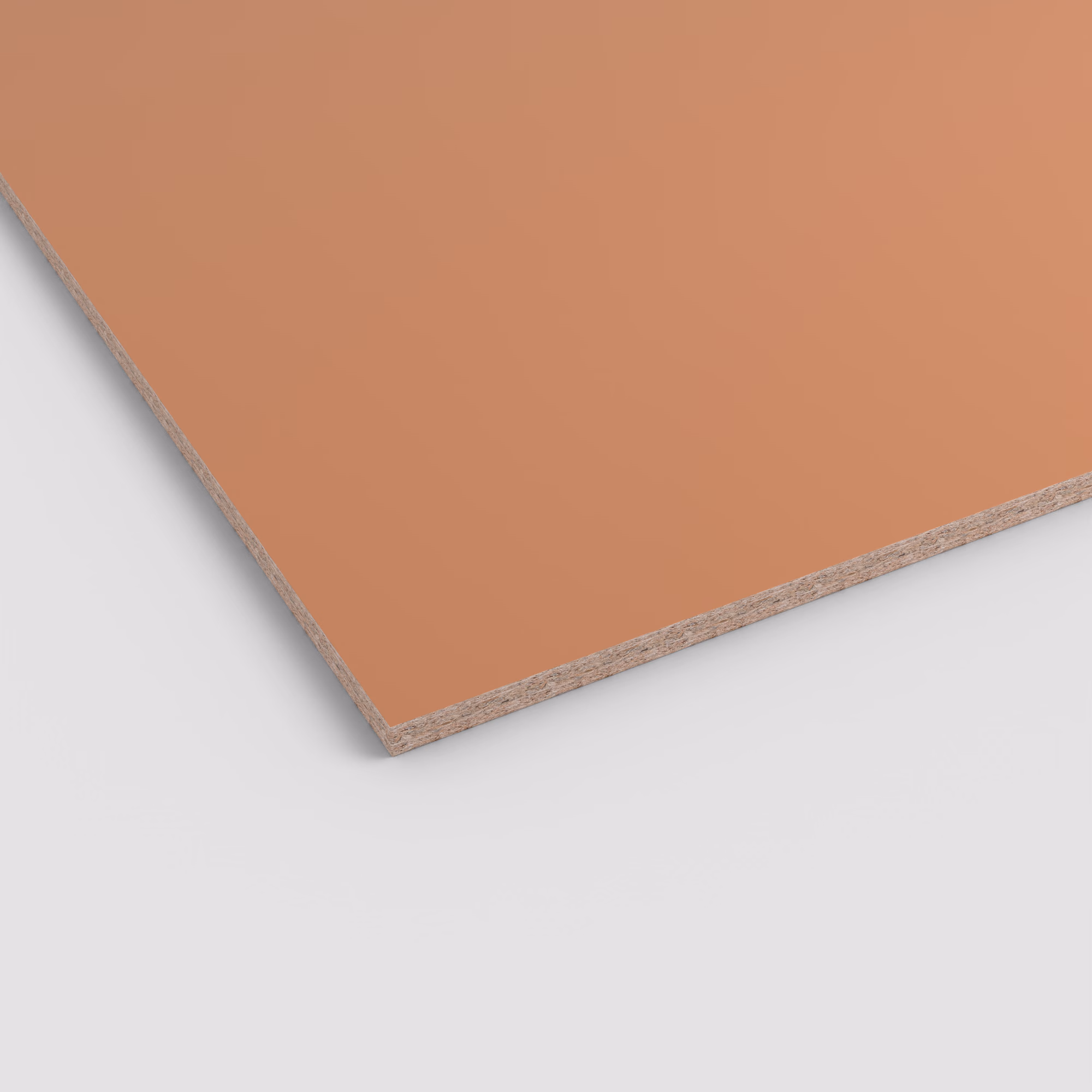 EGGER Eurodekor Spanplatte U830 ST9 in 19mm. Ansicht der matten, unifarbenen Oberfläche in warmem Apricot und des Spanplattenkerns. Abriebfest und lichtecht.