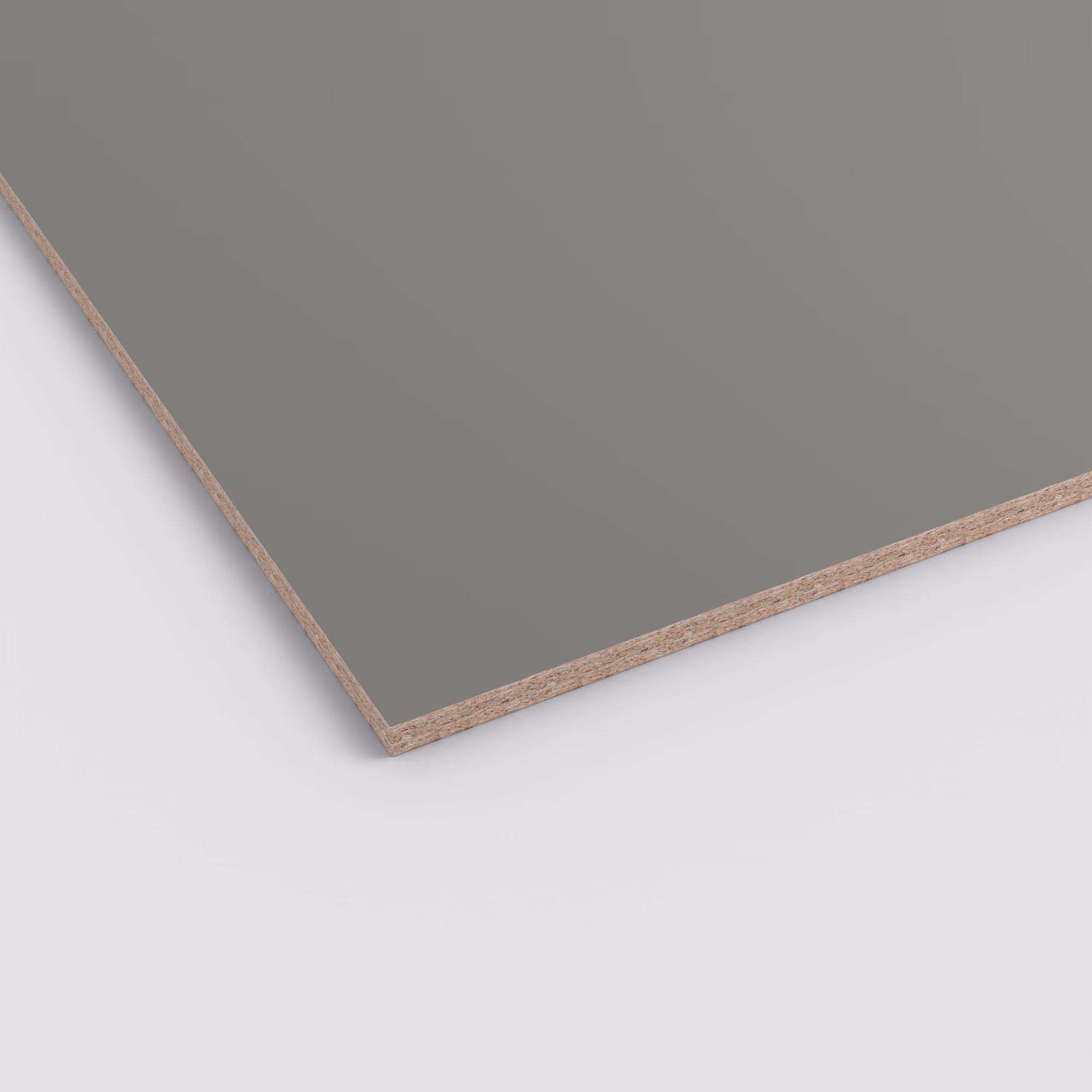 Graue, matte Oberfläche der EGGER Eurodekor Spanplatte U669 ST9. Die Kante zeigt den 8mm starken, groben Spanplattenkern. Dekorspanplatte im Format 2800x2070mm.